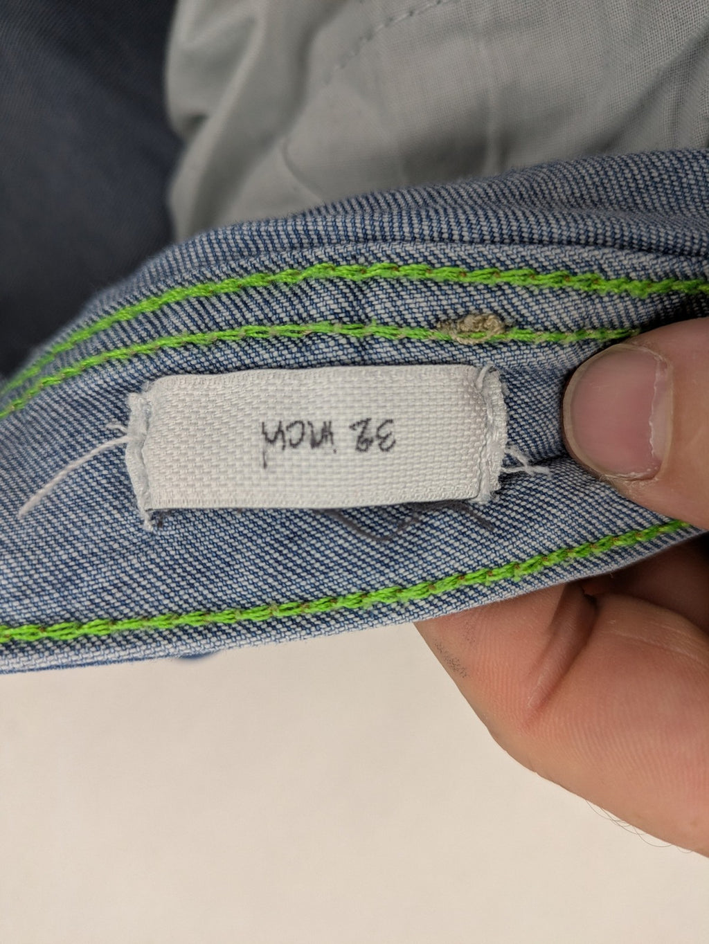 Cecil blue straight jeans with neon green accents and classic 5-pocket design.