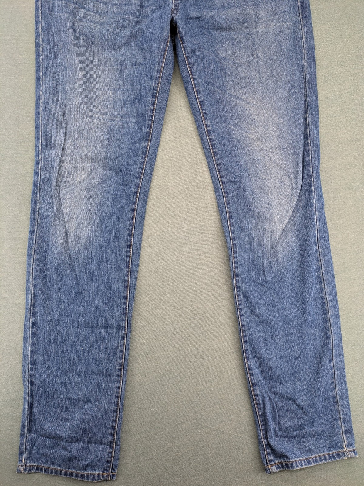 Benetton Jeans blue straight leg denim with button fly and classic design.