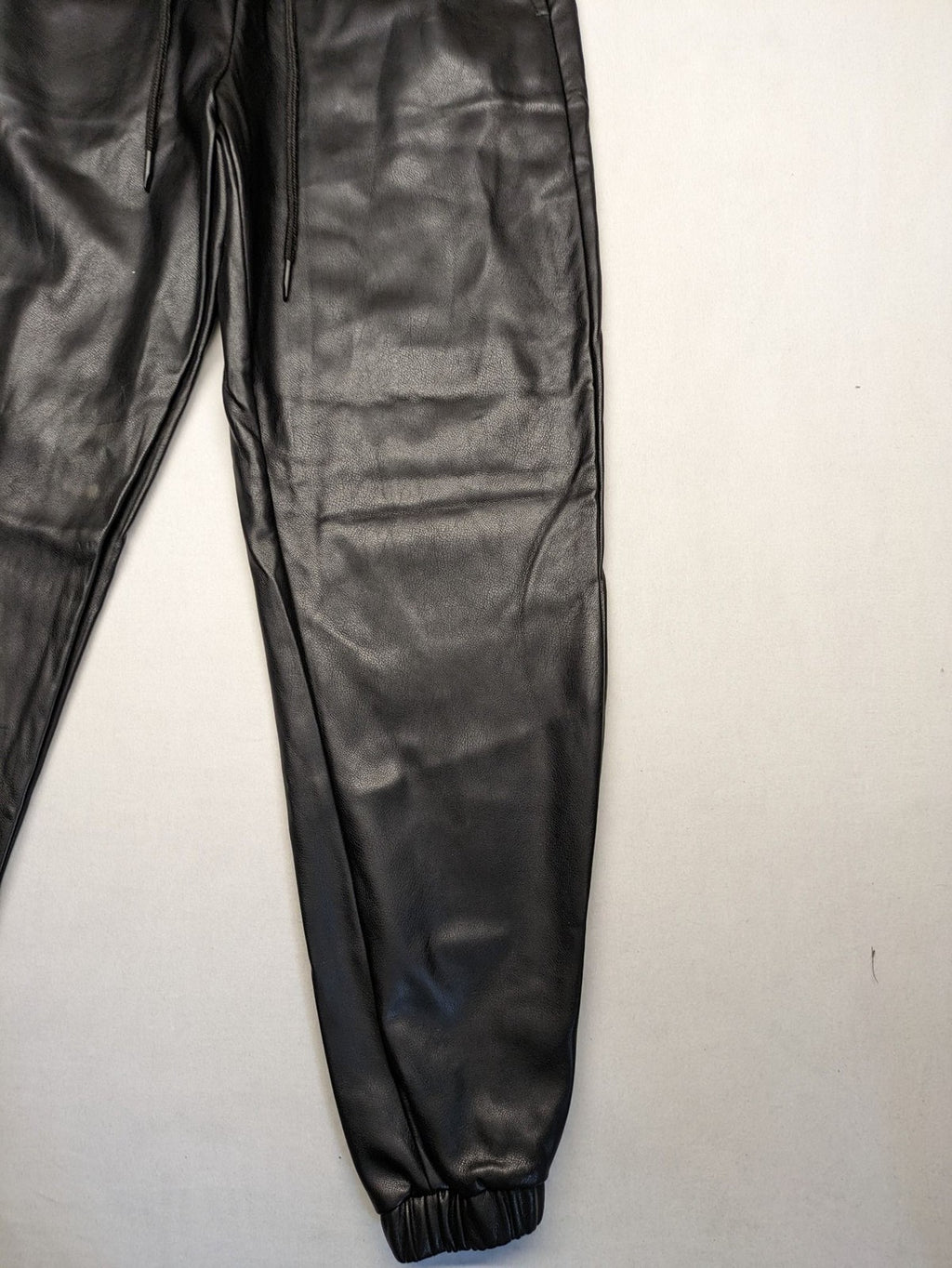 Jophy&Co black jogger pants faux leather look elastic waistband and side pockets
