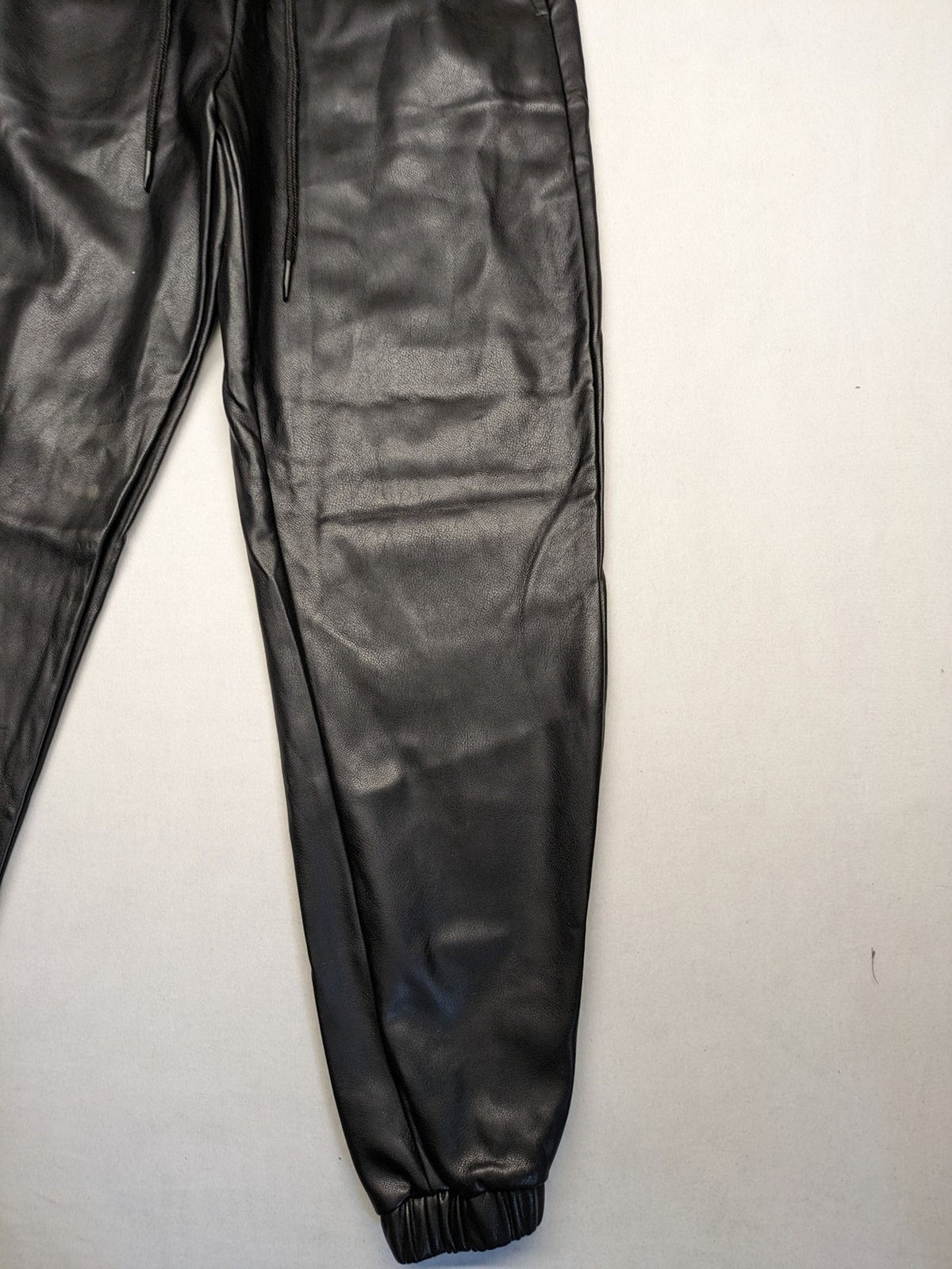 Jophy&Co black jogger pants faux leather look elastic waistband and side pockets