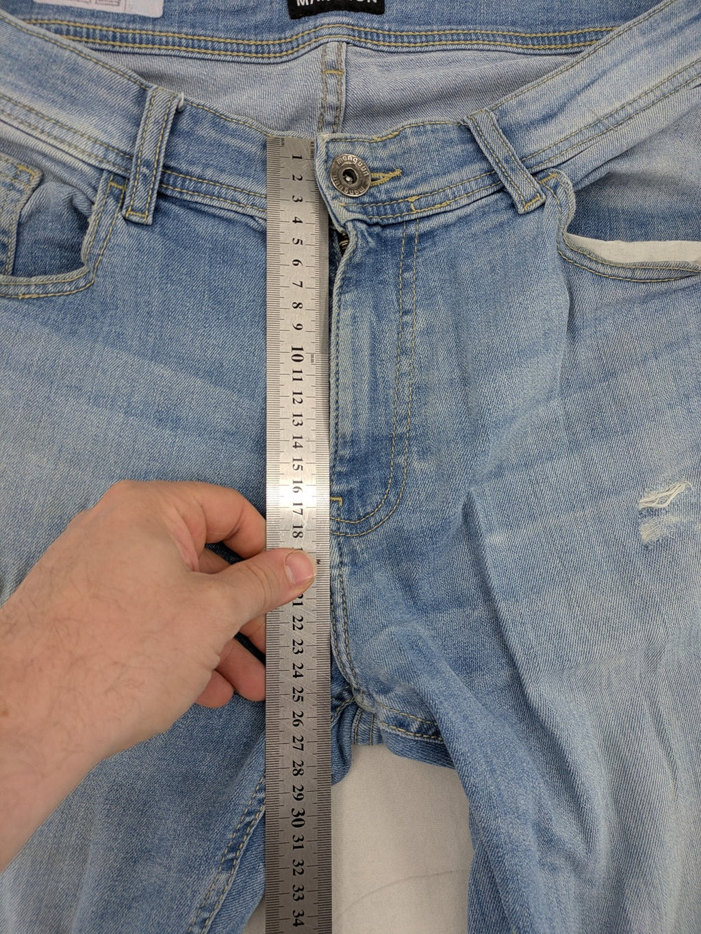 Manguun blue straight jeans with distressed wash and classic 5-pocket design.