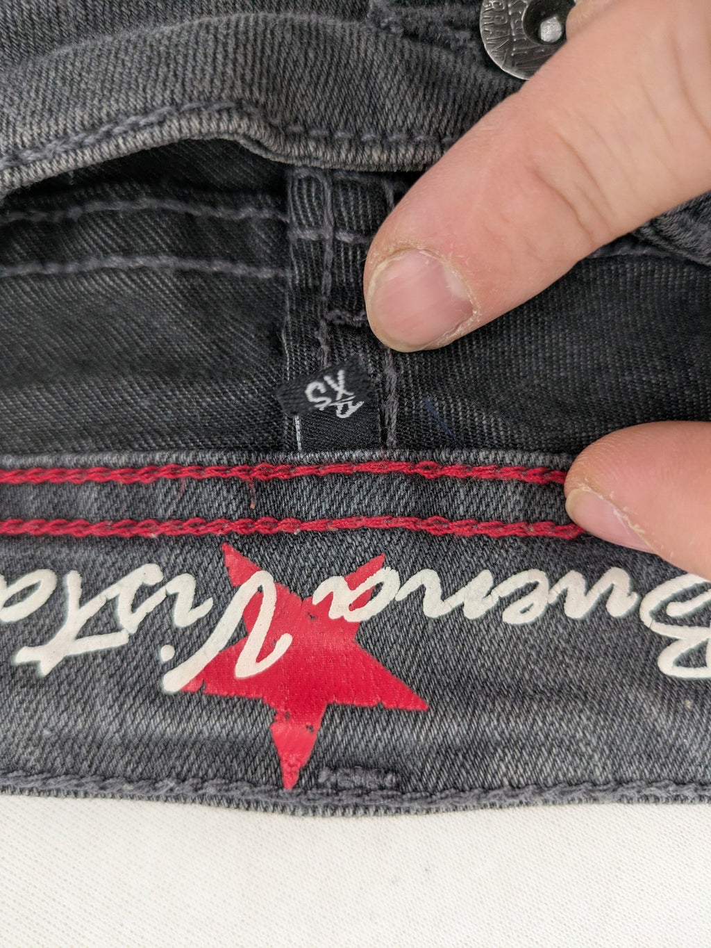 Buena Vista grey skinny jeans with button fly and stretch denim material.