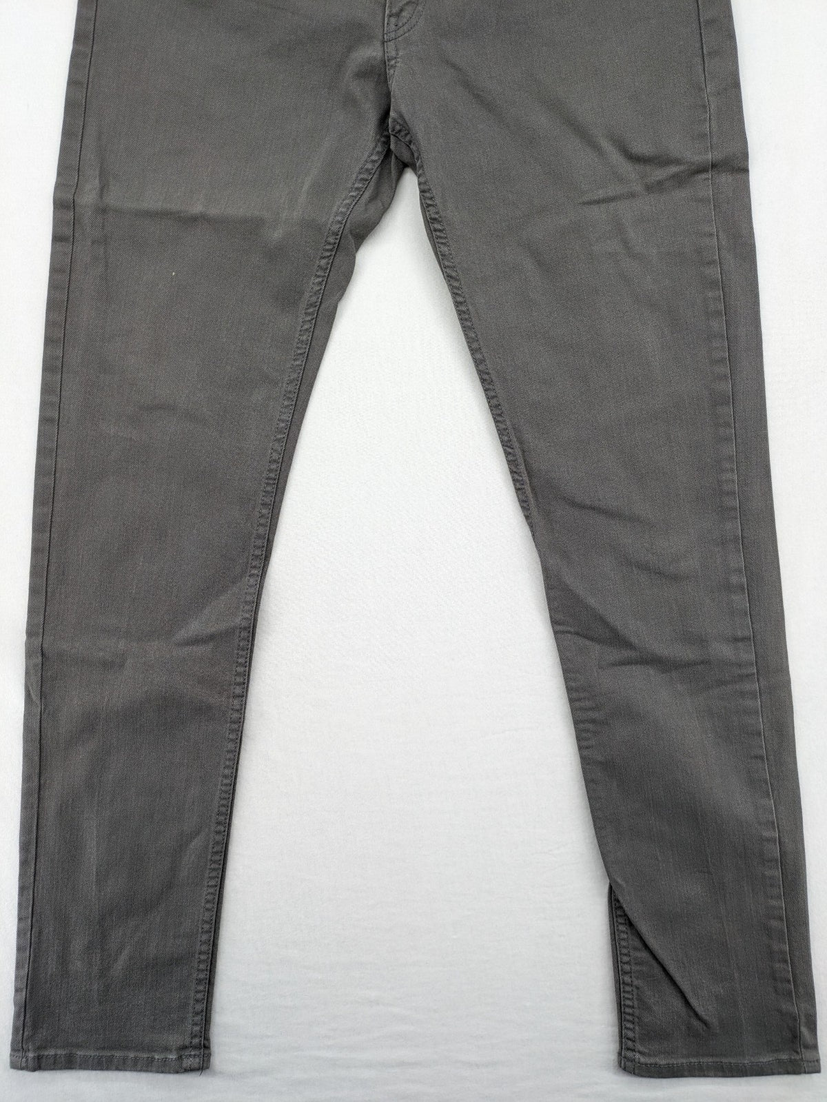 H&M grey skinny fit jeans with button closure and five-pocket design, cotton-elastane blend.