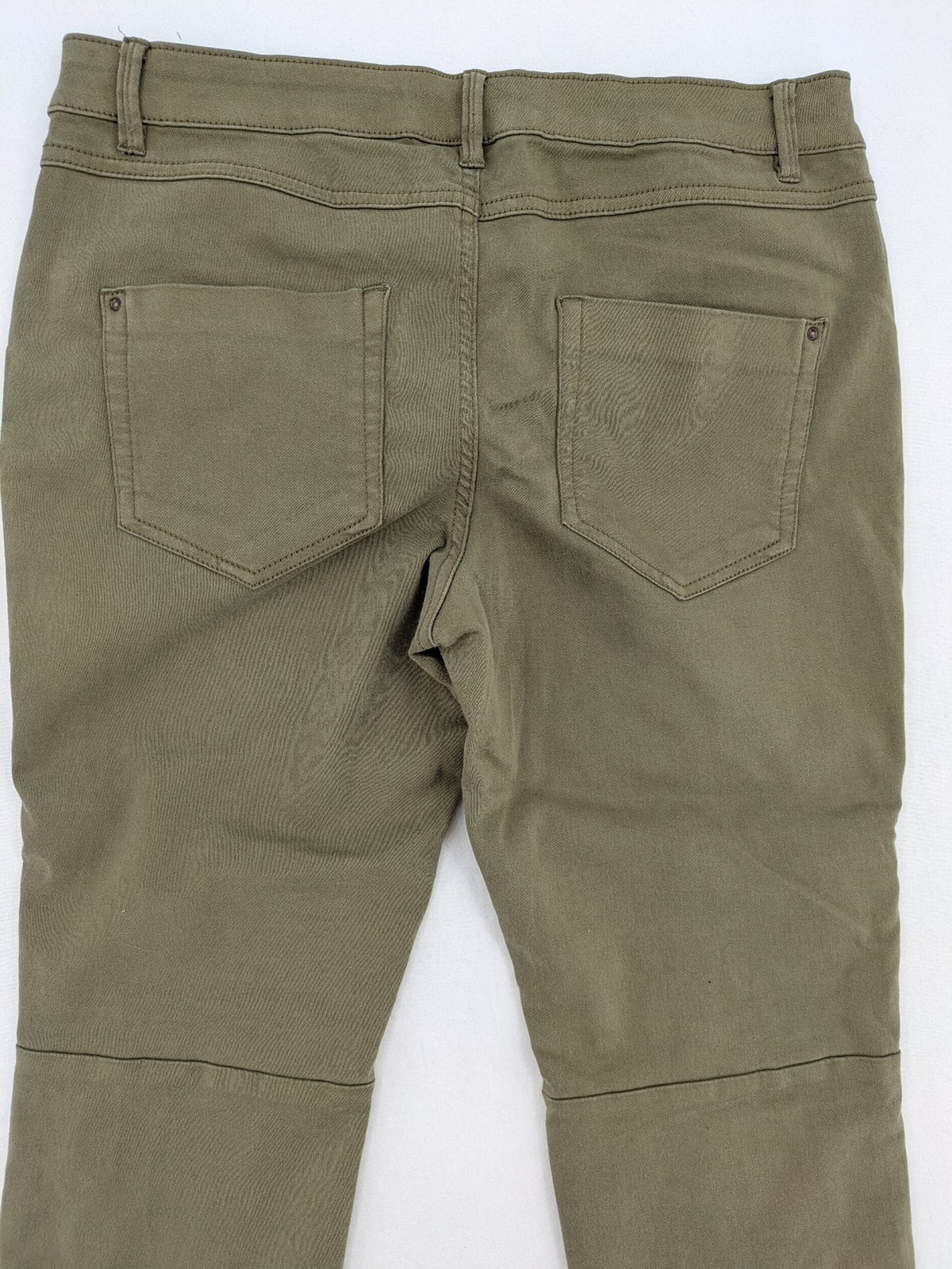 Clockhouse green moto jeggings with ribbed knee panels and ankle zippers.