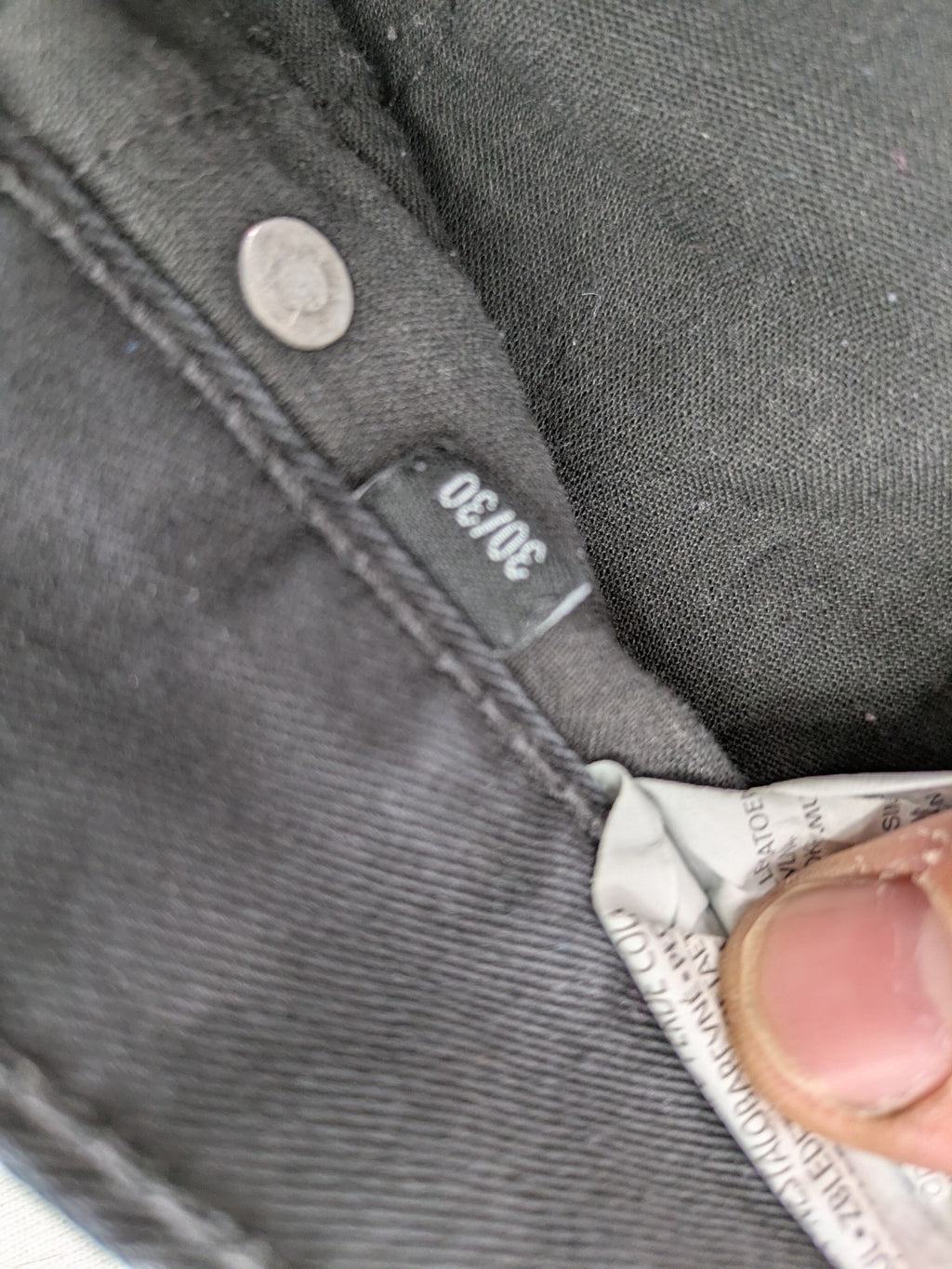Ckh grey straight fit jeans with button fly and faded wash details.