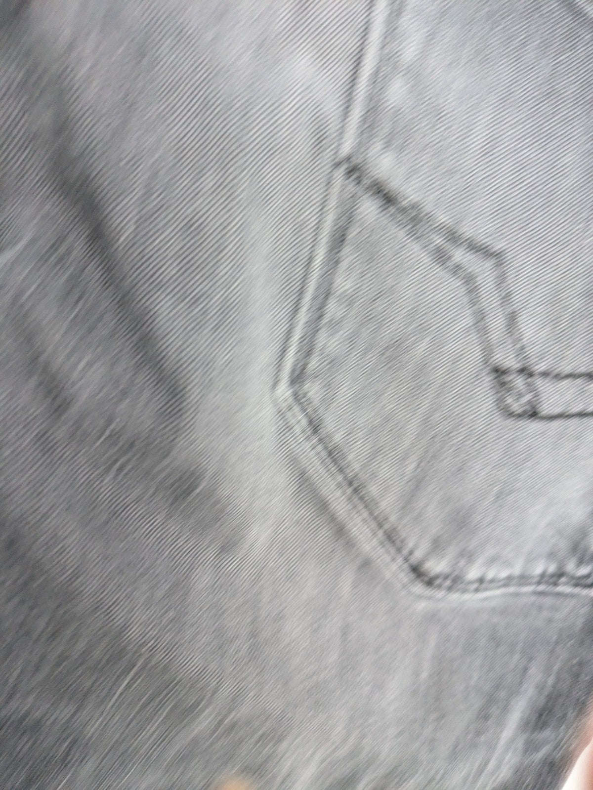 Replay grey straight jeans faded wash five-pocket style with logo on pocket.