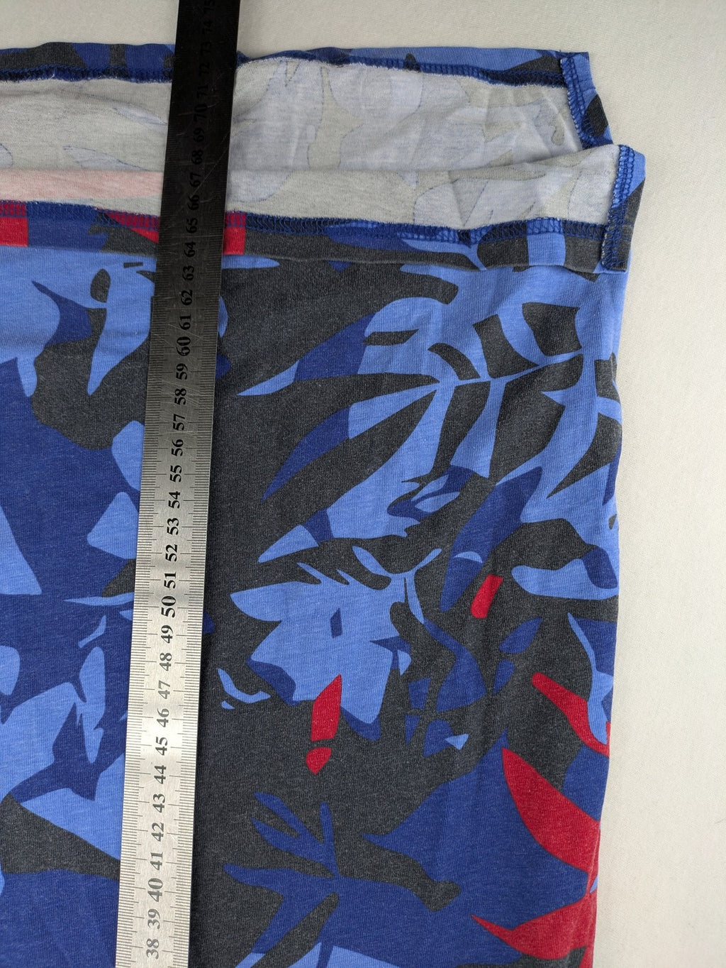 Ulla Popken blue top with floral print, V-neck, 3/4 sleeves, soft cotton blend.
