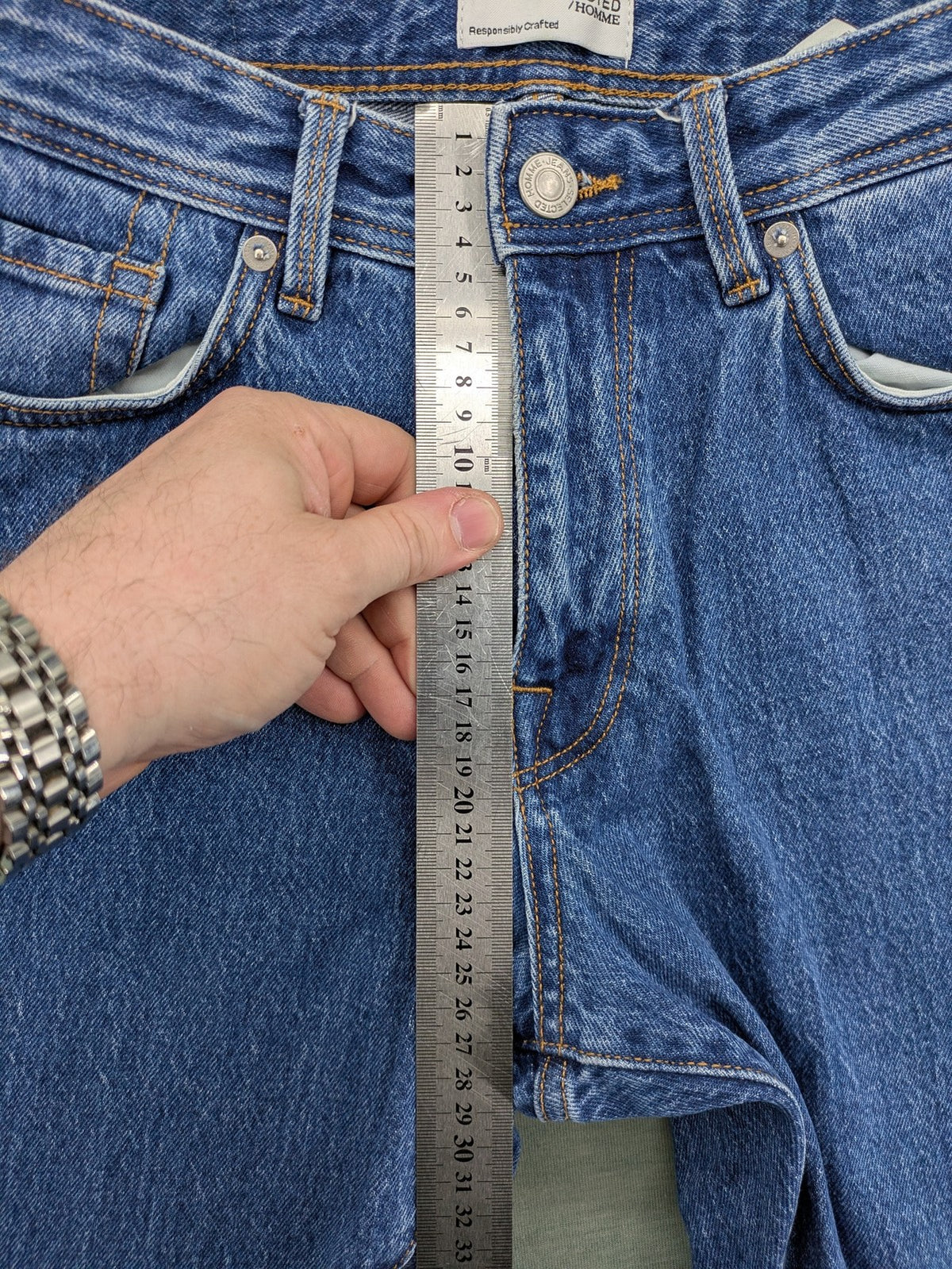 Selected Homme blue straight fit jeans with classic five-pocket design and medium wash denim.