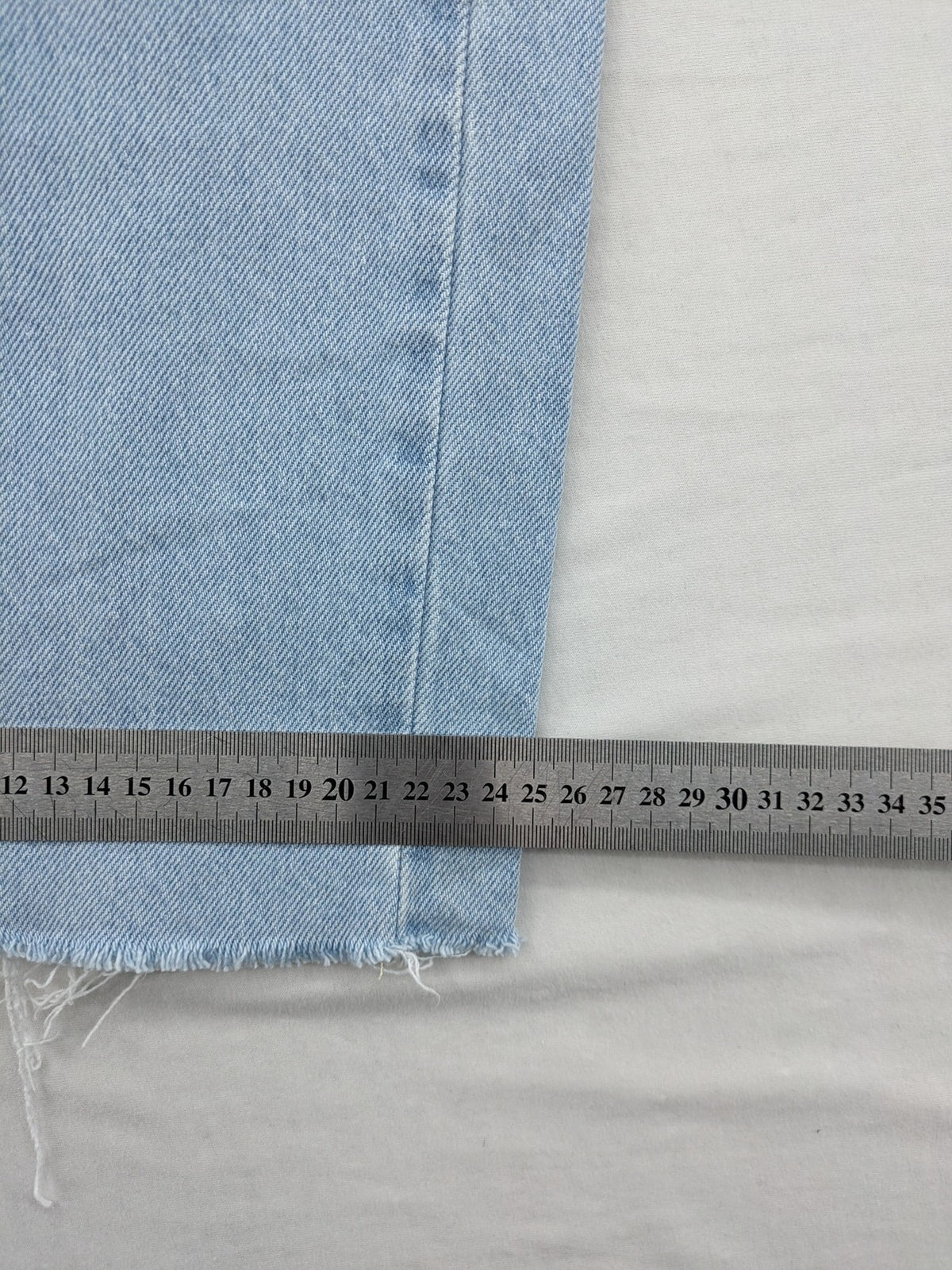 MNG blue straight jeans with cargo pockets and raw hem, high waist denim.