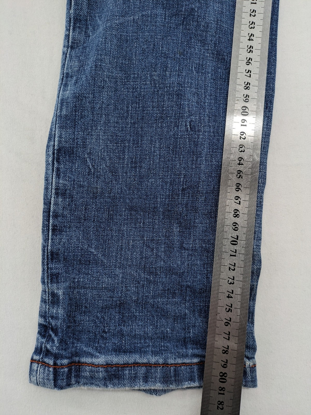 Timezone blue straight jeans slim fit with checkered pattern lining and button fly.