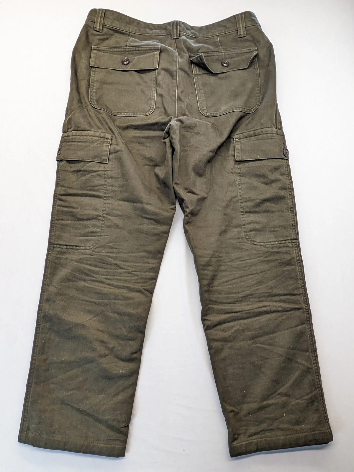 Lands' End green cargo pants with plaid flannel lining and traditional fit design.