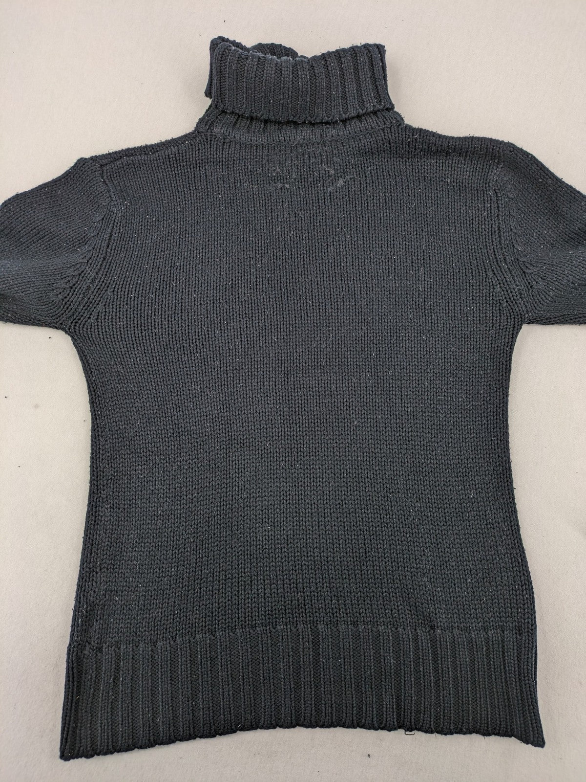 Fishbone grey turtle neck jumper with ribbed cuffs and soft acrylic knit material.