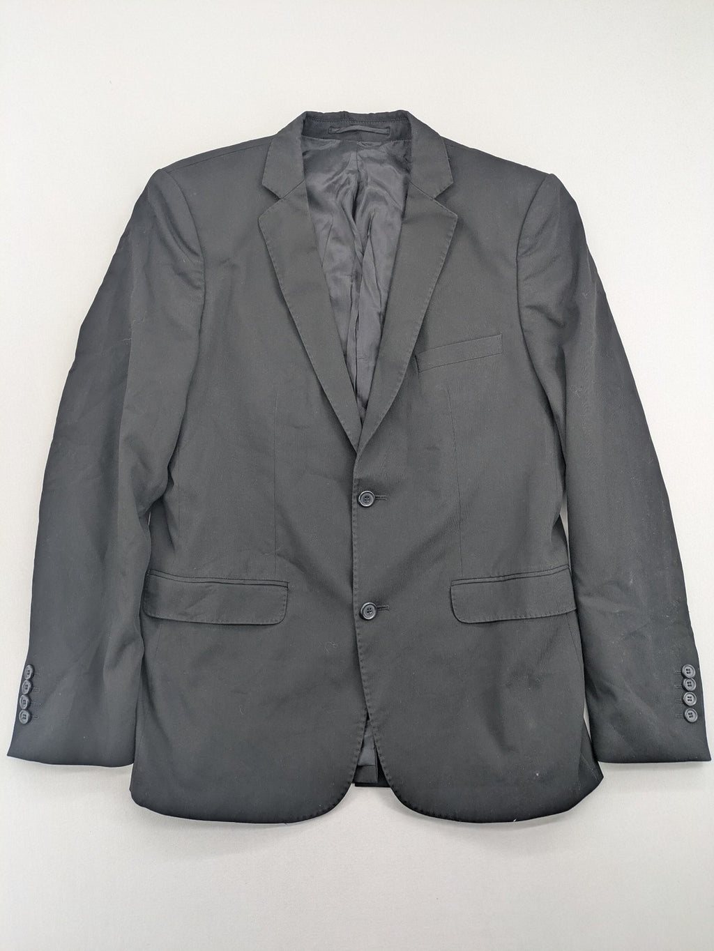 Zara Man grey blazer two-button design with structured silhouette and smooth lining.
