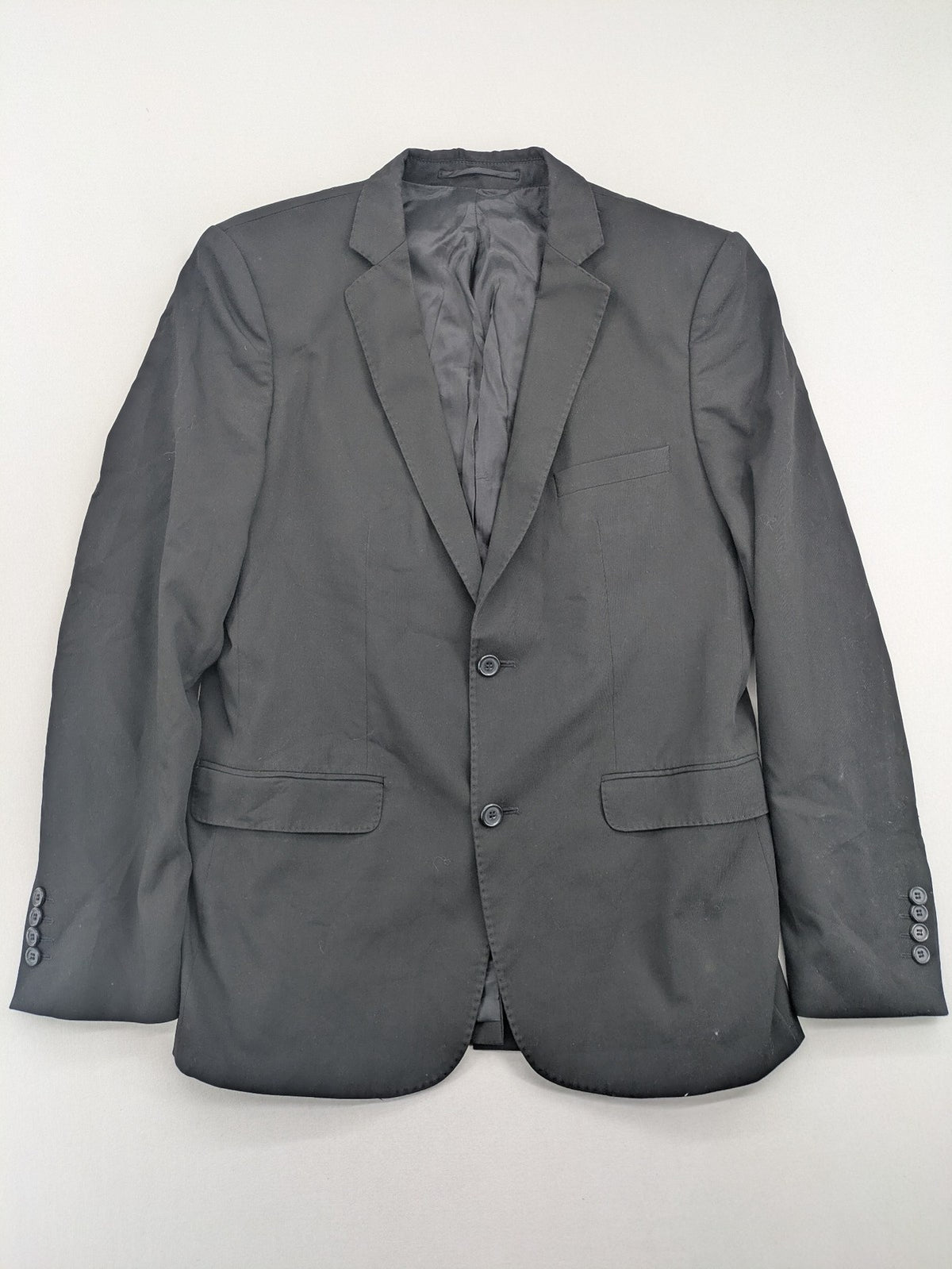 Zara Man grey blazer two-button design with structured silhouette and smooth lining.