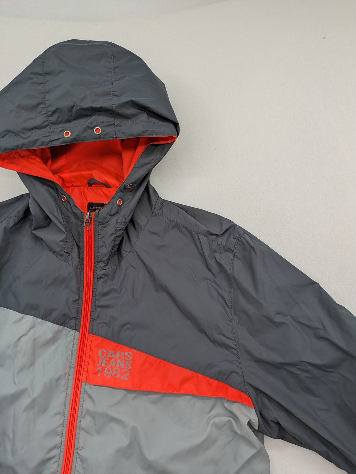 Cars Jeans windbreaker jacket grey orange color block design with logo on chest.