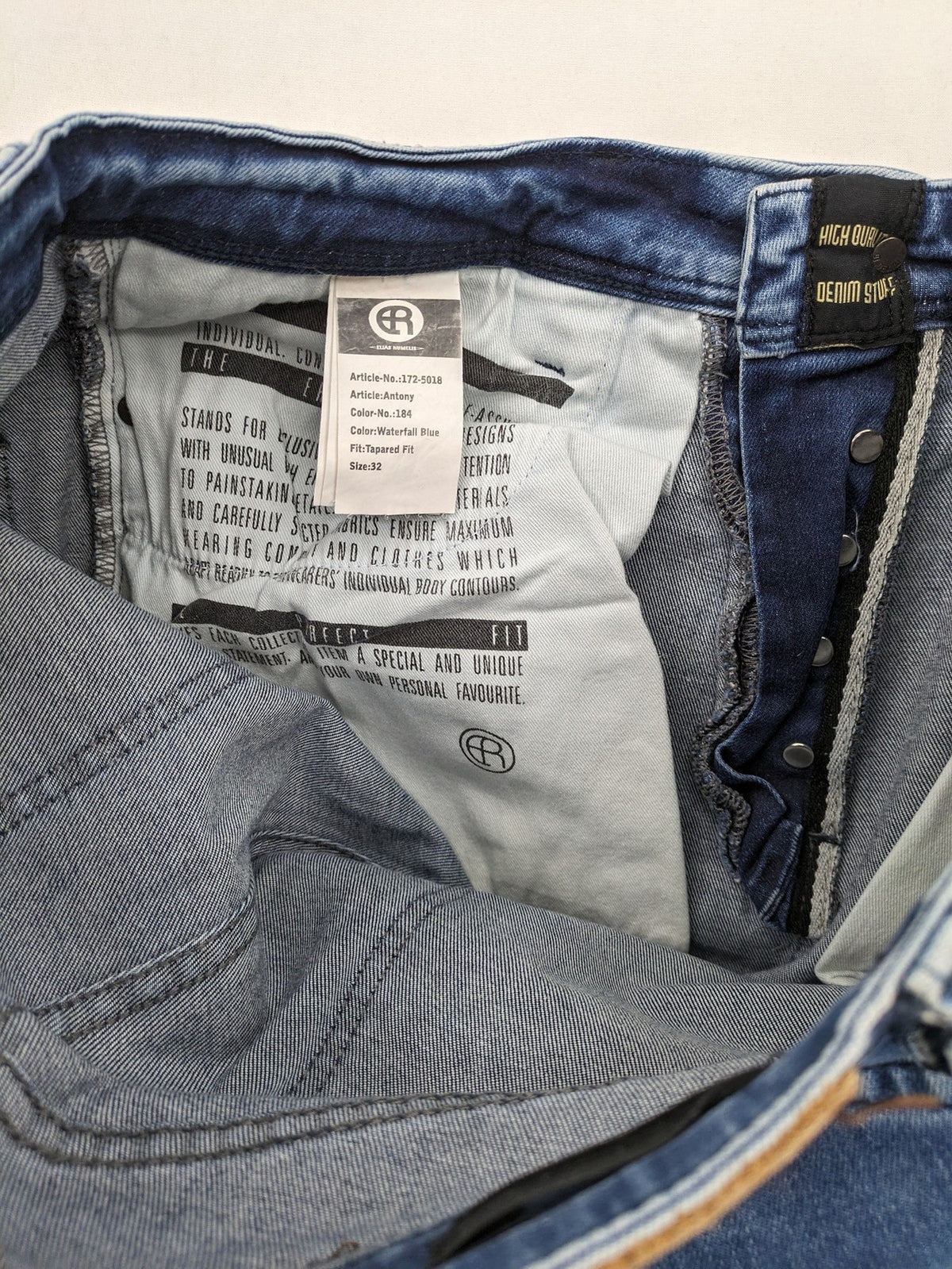 W32 blue straight jeans distressed details tapered fit button fly design