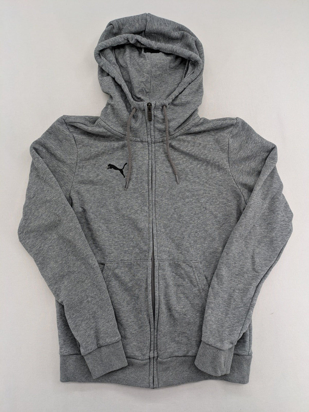 Puma grey full zip hoodie with adjustable drawstring hood and logo detail.