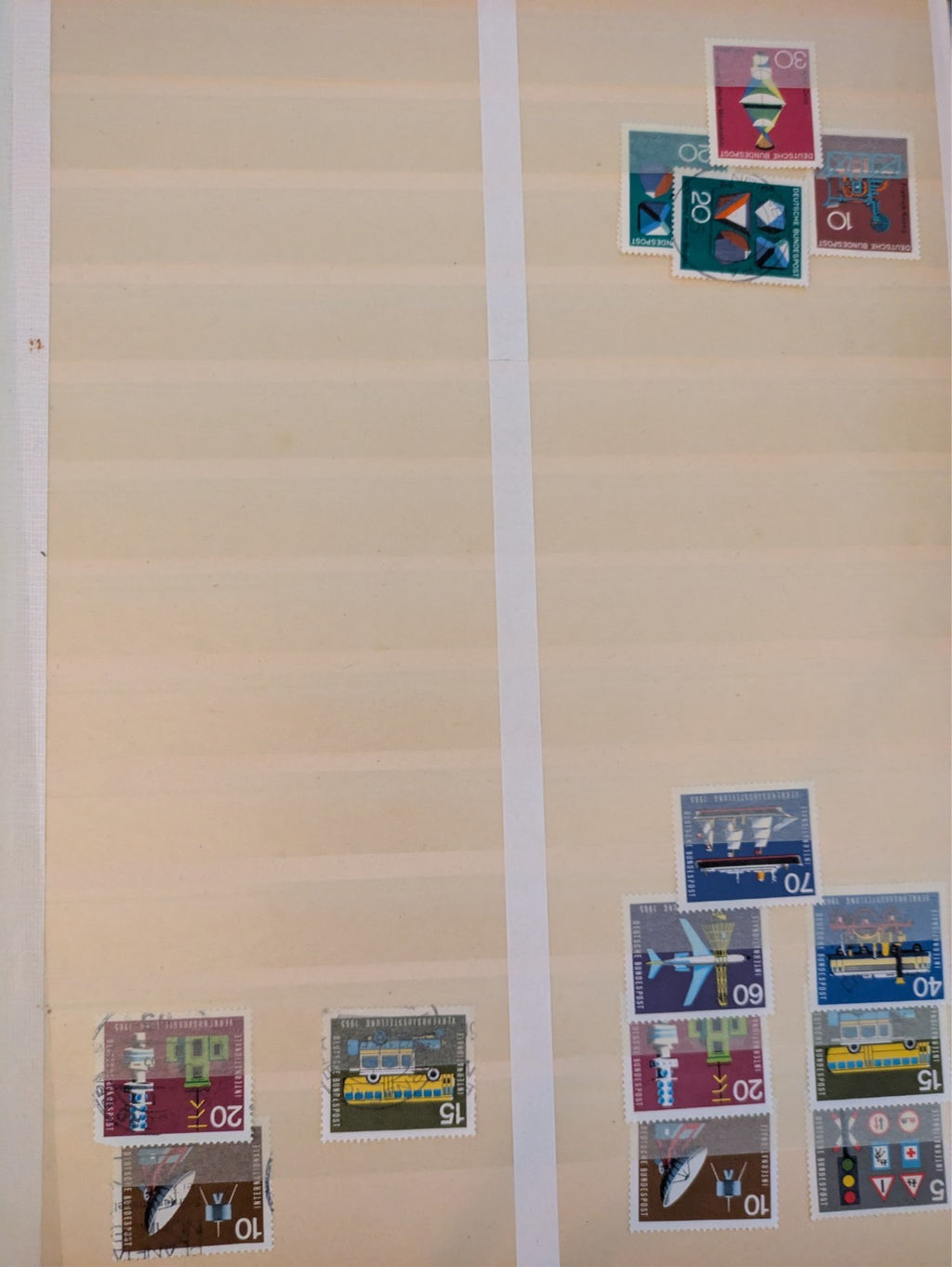 Beige postage stamp album featuring over 1000 stamps from Germany and Europe.