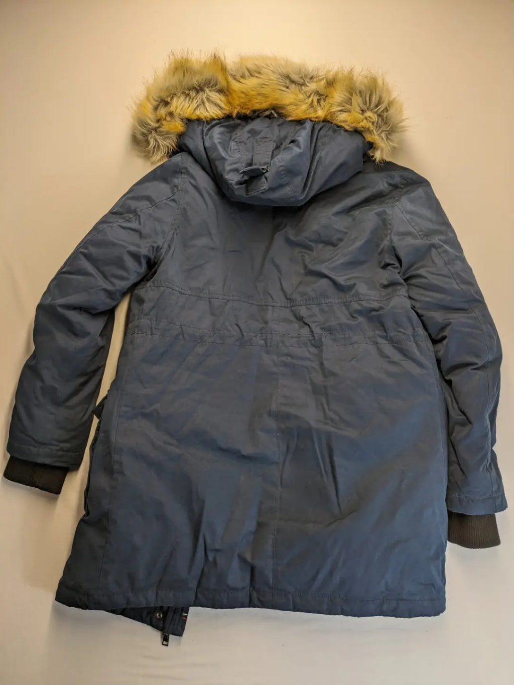 Tommy Hilfiger Denim blue parka coat with faux fur hood and Sherpa lining.