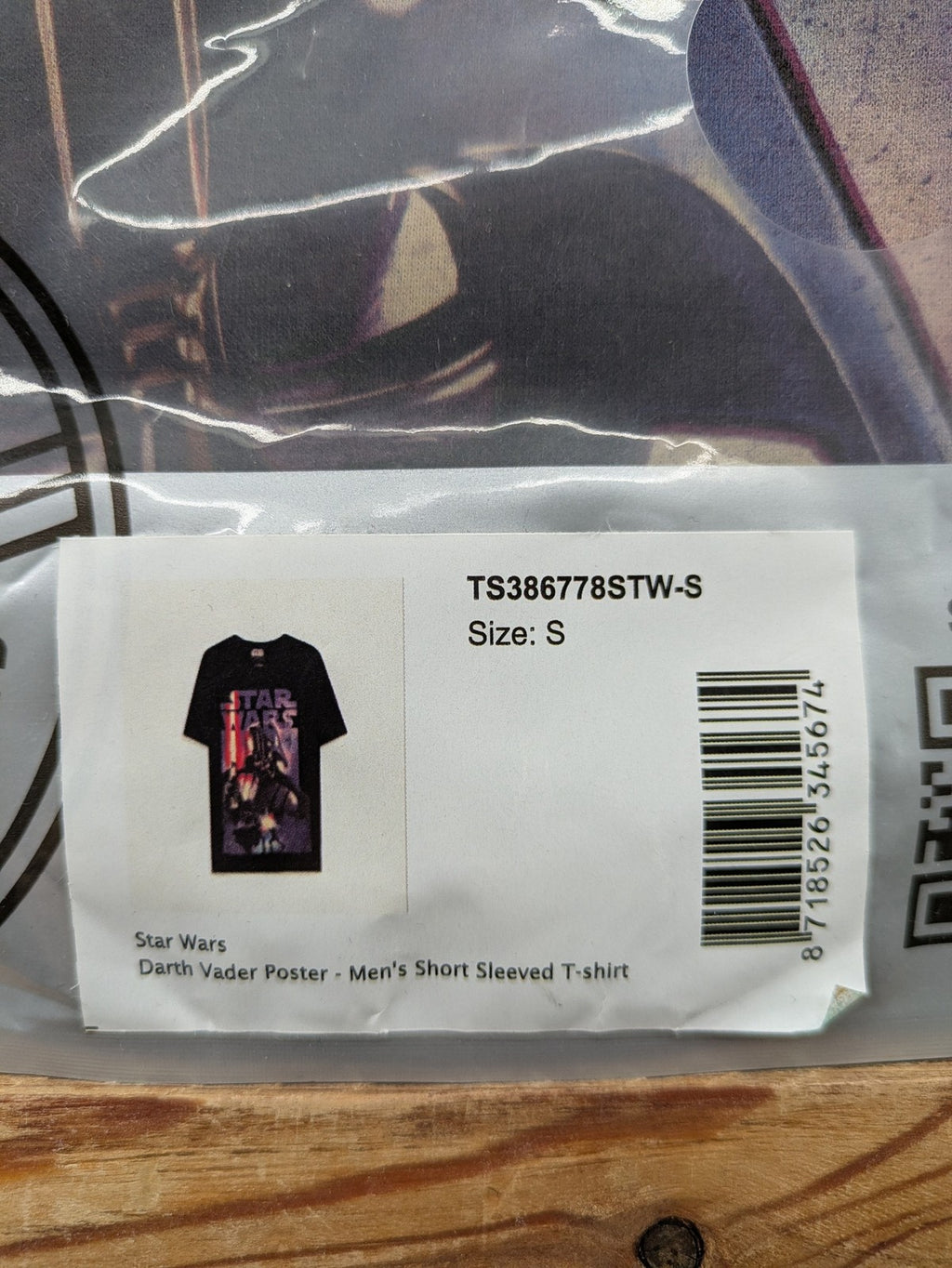 Star Wars multi t-shirt featuring large Darth Vader poster graphic and short sleeves.