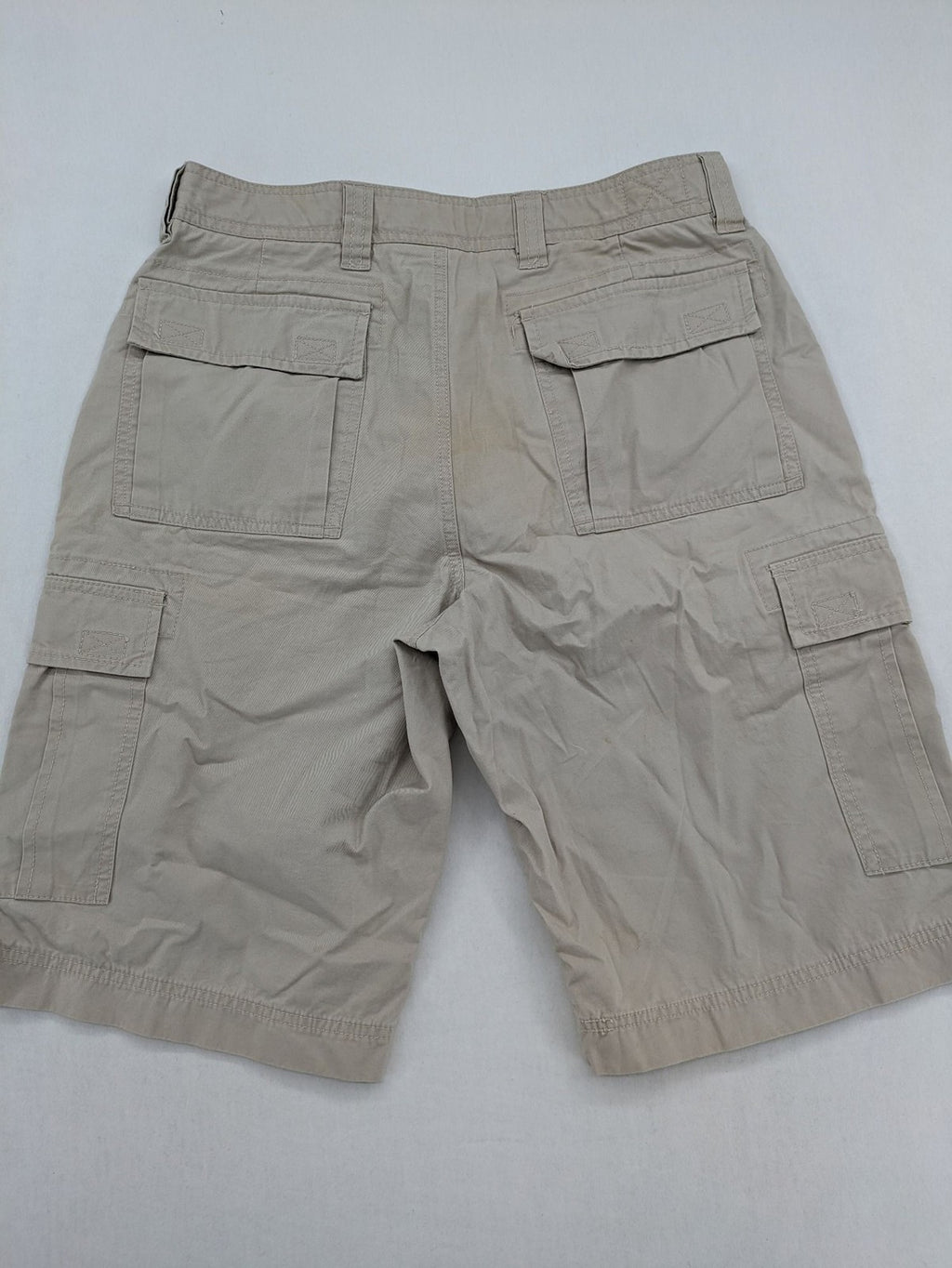 Grey Connection beige cargo shorts with multiple pockets and button closure, made from cotton.