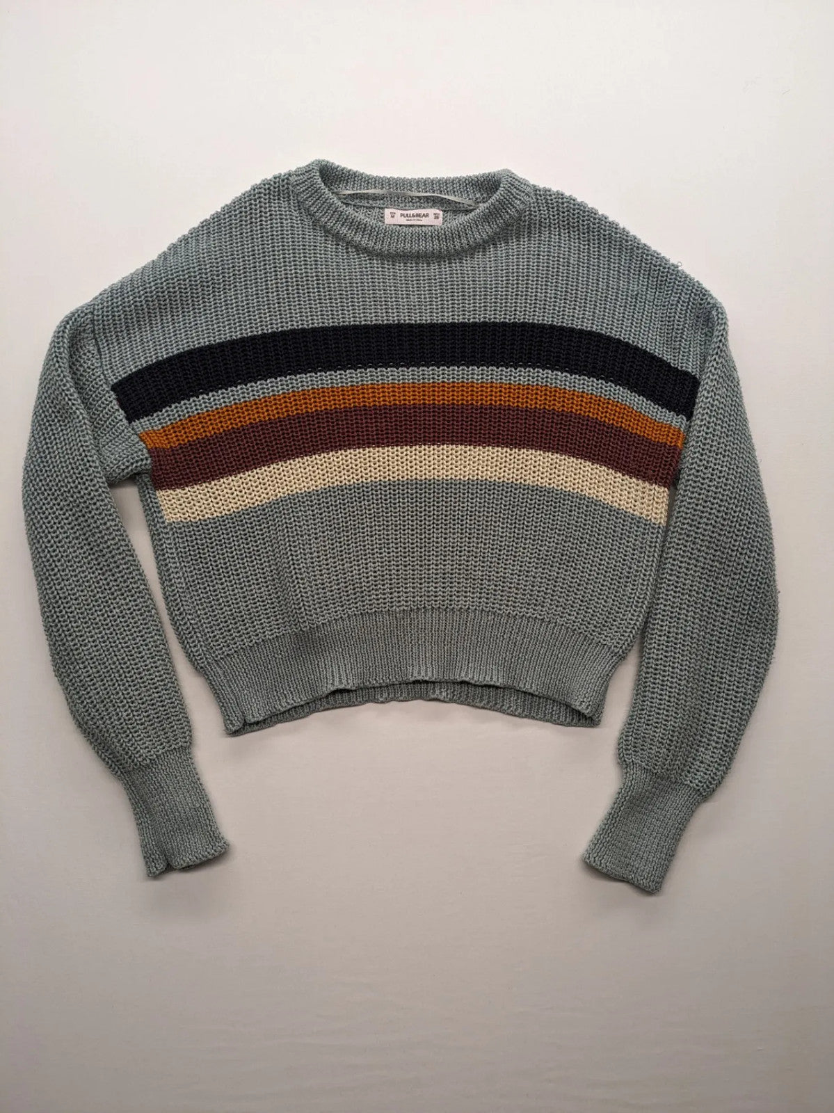 Pull&Bear beige turtle neck jumper with block stripe pattern and ribbed knit texture.