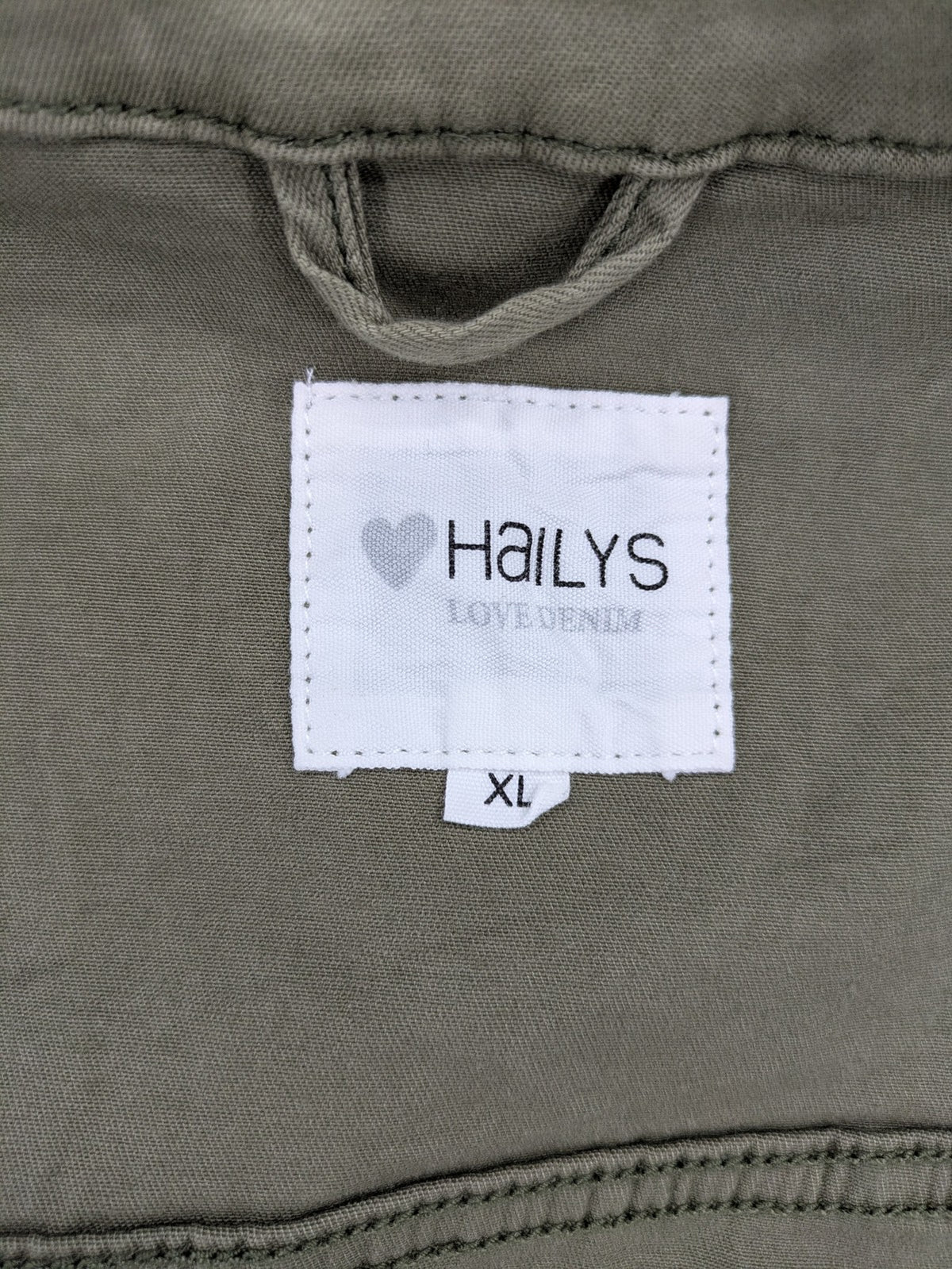 Hailys khaki denim jacket with button closure, two chest pockets, and side pockets.