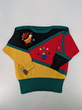 Pullover multi knit jumper featuring colorful block pattern and embroidered rooster and flowers.