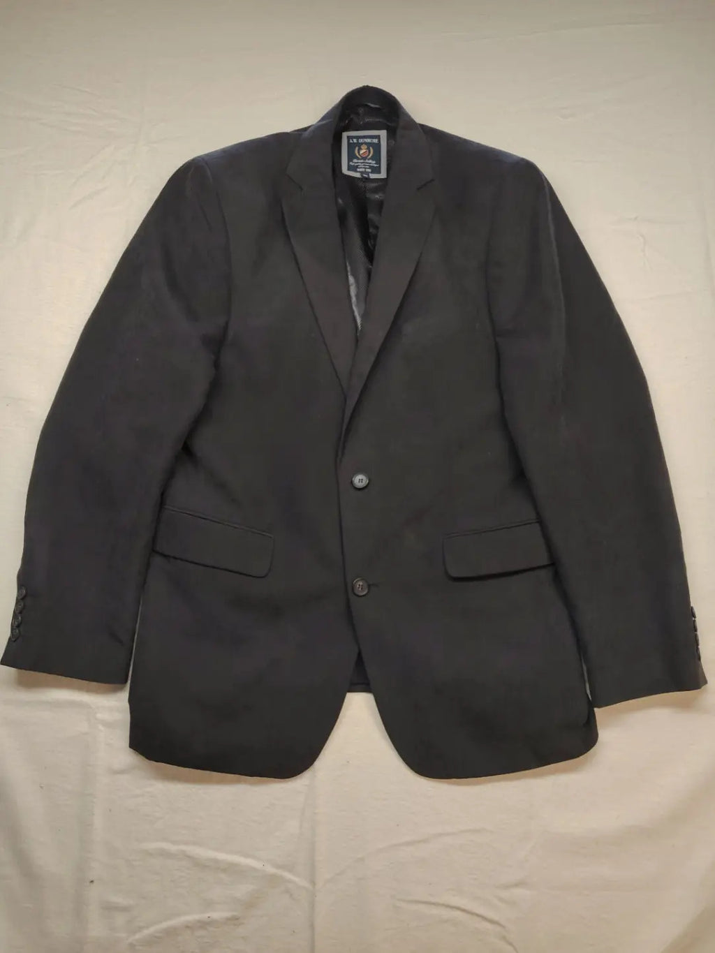 dunmore black blazer two-button design with falling lapels and multiple pockets