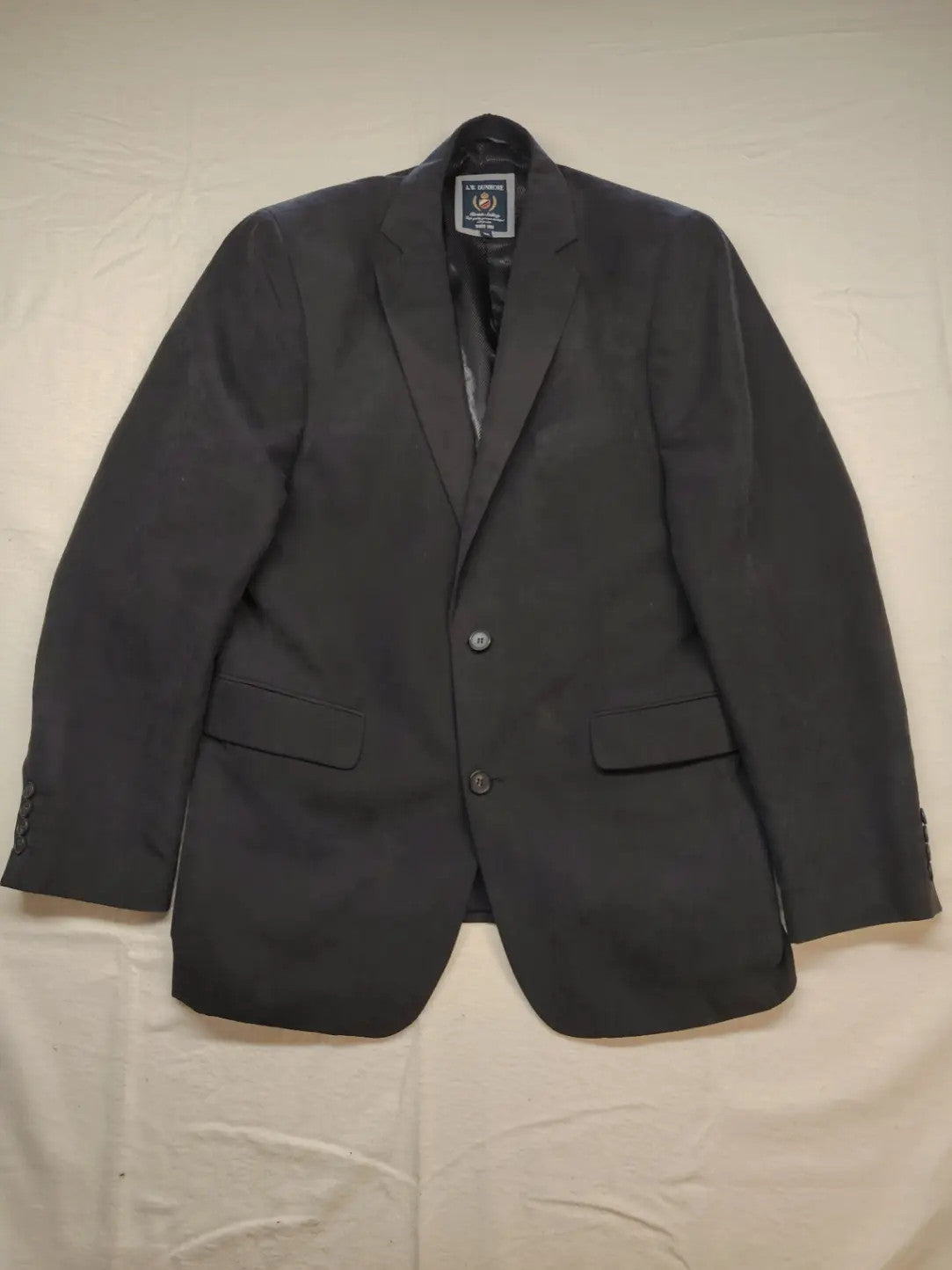 dunmore black blazer two-button design with falling lapels and multiple pockets