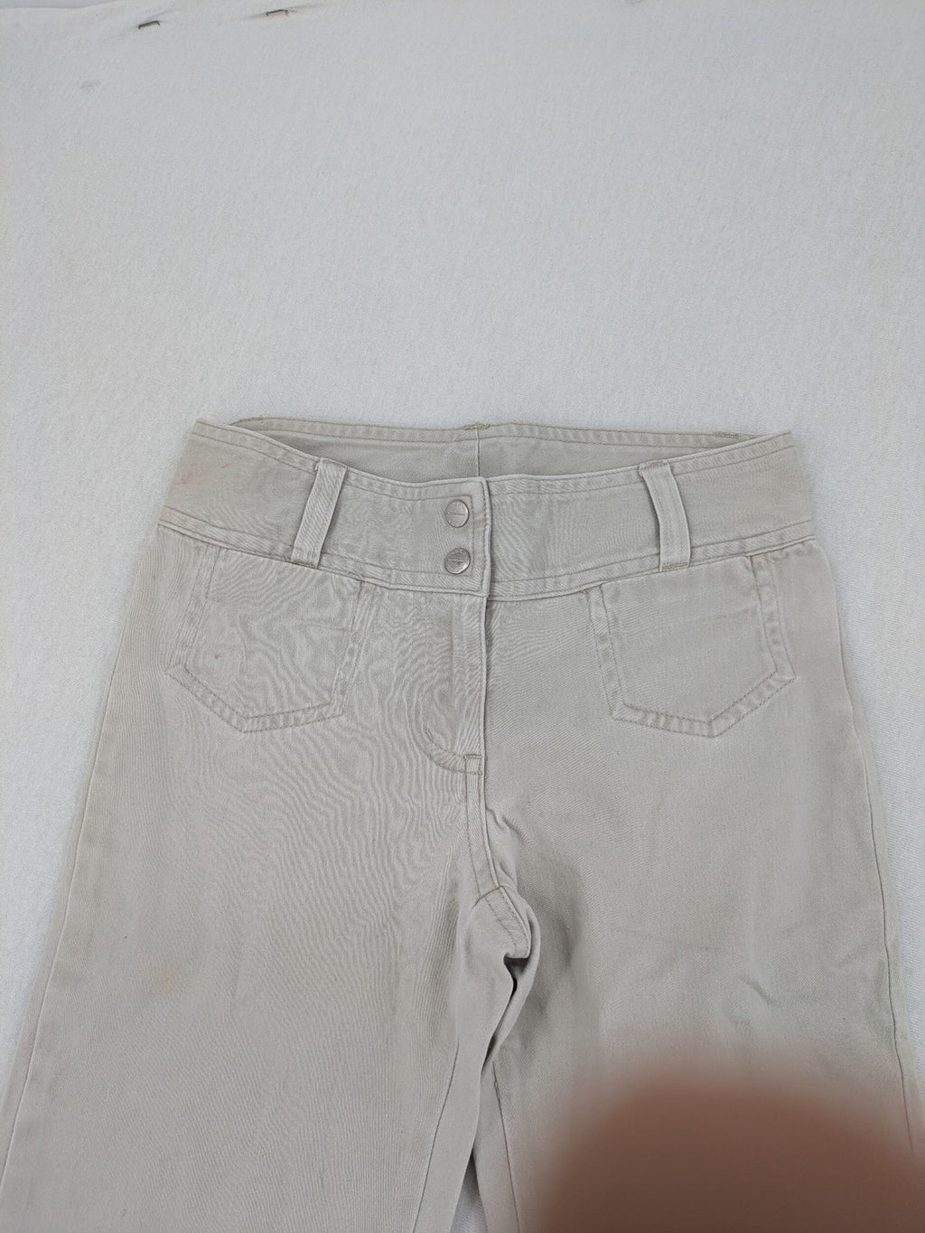 H&M L.O.G.G beige bootcut pants with double button closure and stretch cotton material.