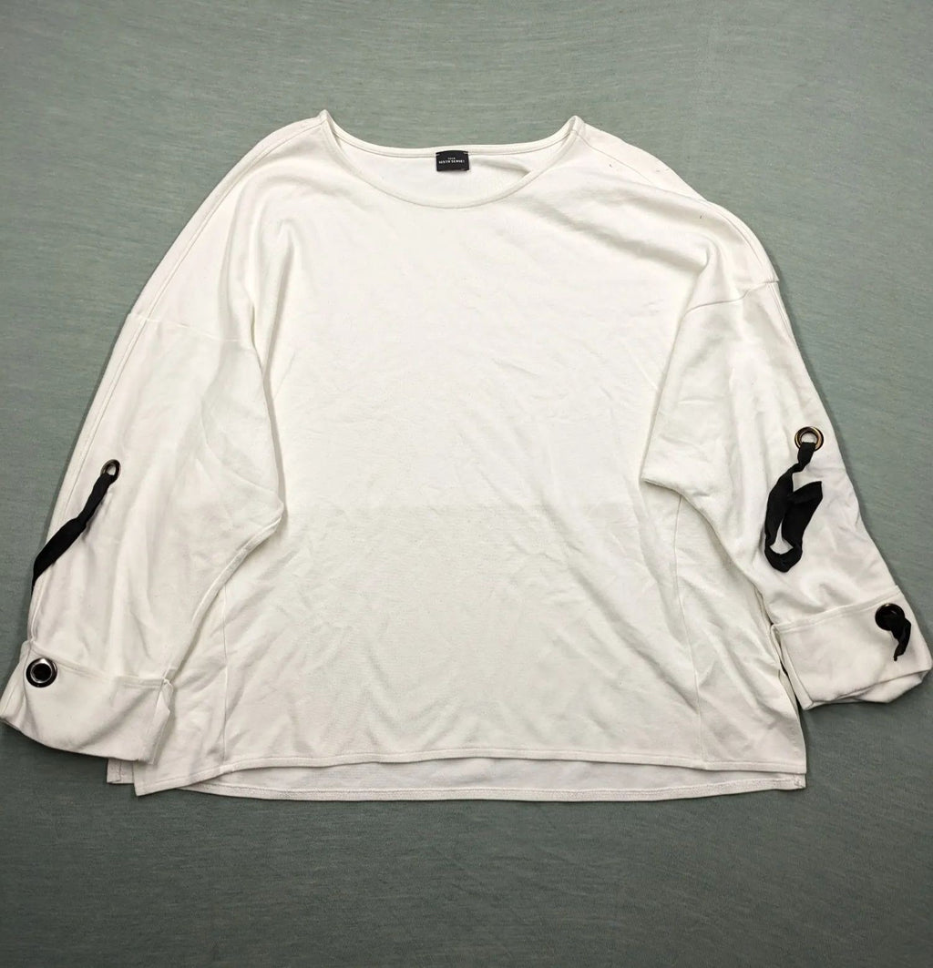 Your Sixth Sense black and white oversized turtle neck jumper with lace-up sleeve details.