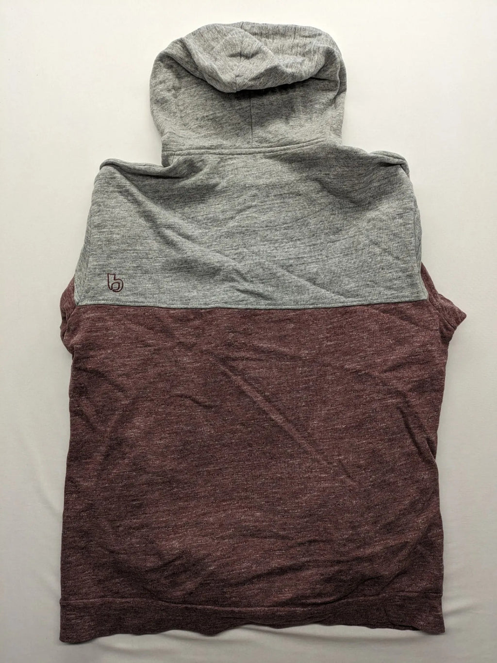 Bleed turtle neck jumper grey burgundy colorblock design with adjustable hood and kangaroo pocket.