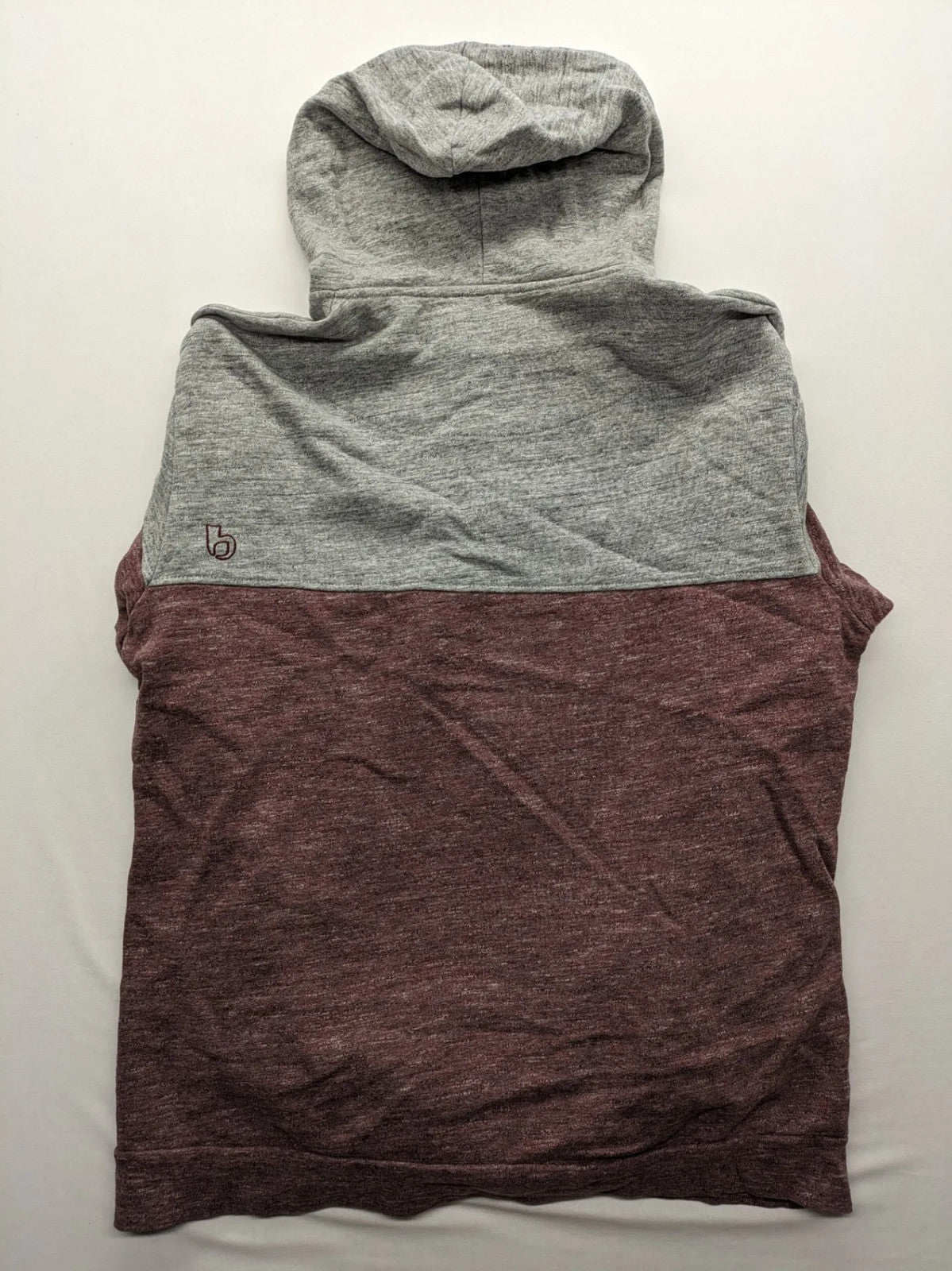 Bleed turtle neck jumper grey burgundy colorblock design with adjustable hood and kangaroo pocket.