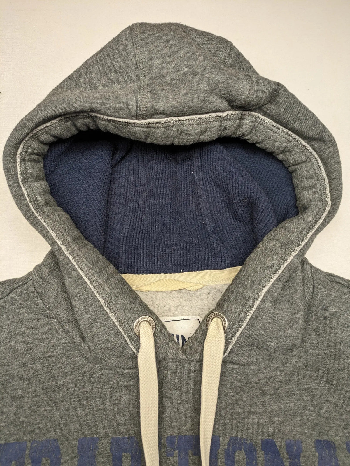 Livergy grey zip-through hoodie with "Traditional Authentic" graphic, kangaroo pocket, soft material.