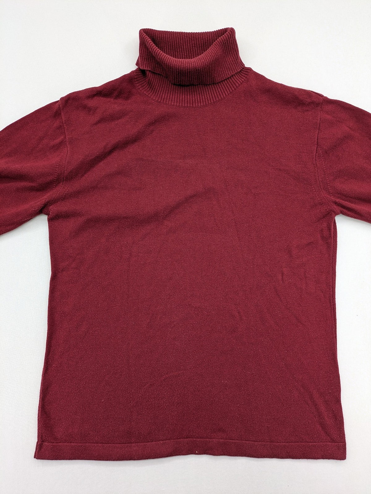 Les Corps burgundy turtle neck jumper with ribbed details and soft cotton blend material.