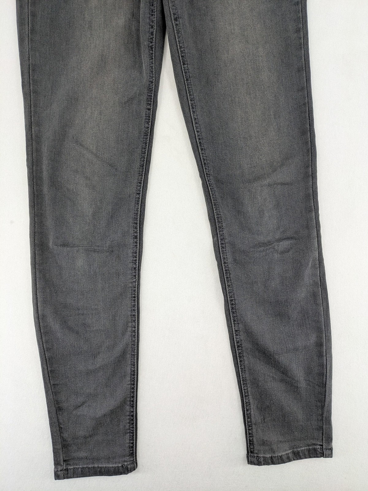 Buena Vista grey skinny jeans with button fly and stretch denim material.
