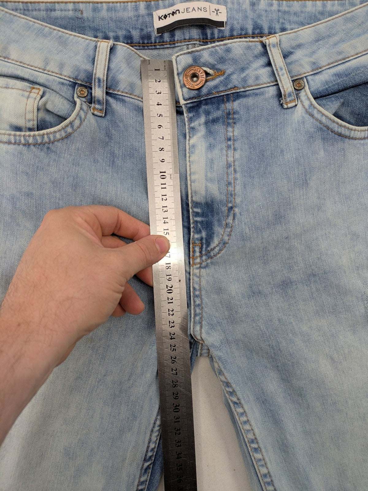 Koton Jeans blue straight jeans with distressed details and classic 5-pocket style.