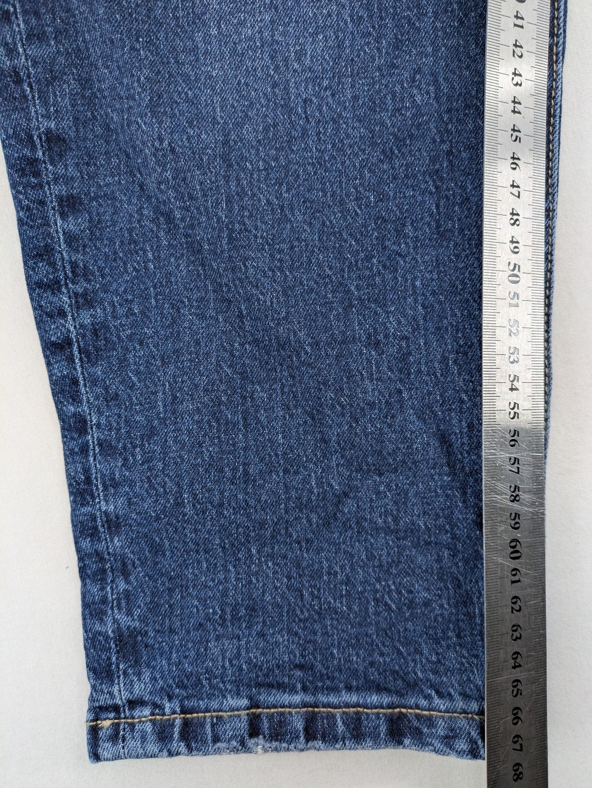 Reserved blue straight jeans high waist with classic fit and stretch cotton material.