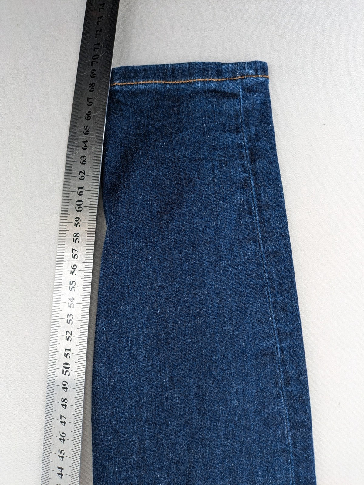 Tommy Hilfiger blue skinny jeans, five-pocket design, made from organic cotton blend.