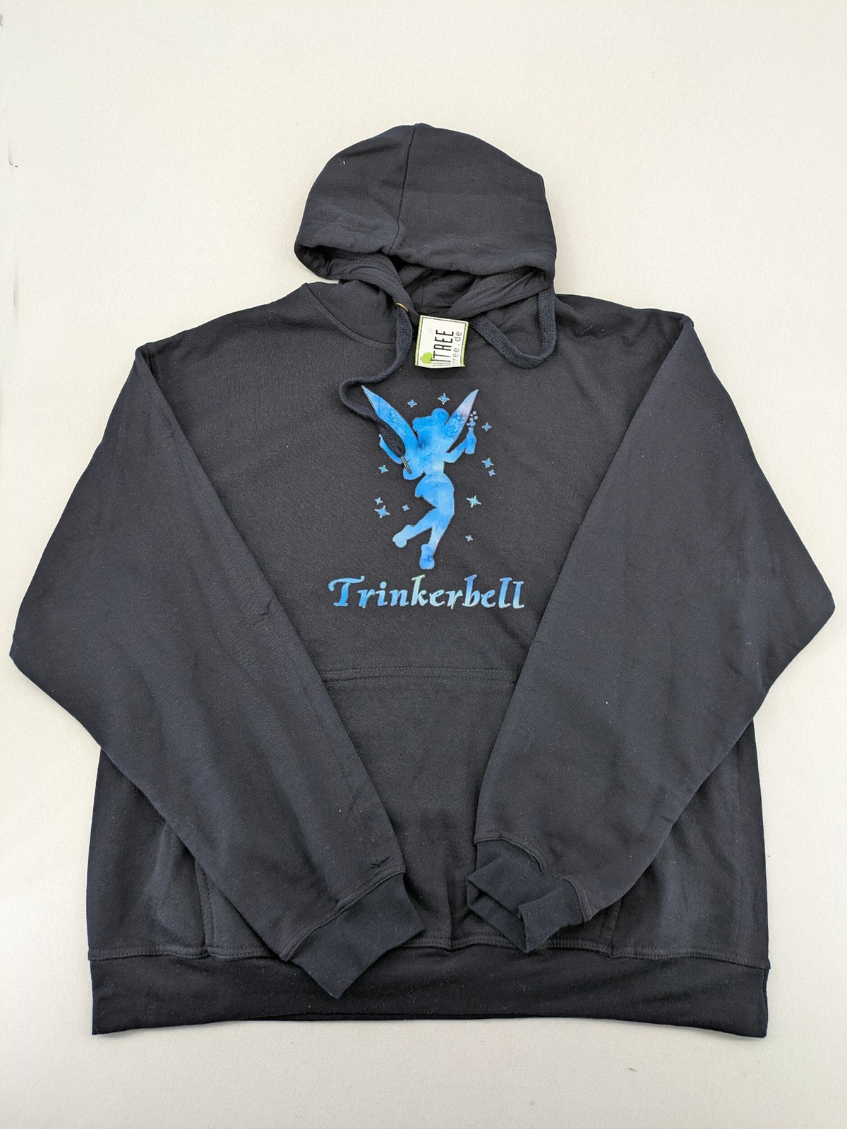 Trinkerbell black zip-through hoodie with blue graphic and adjustable drawstring hood.
