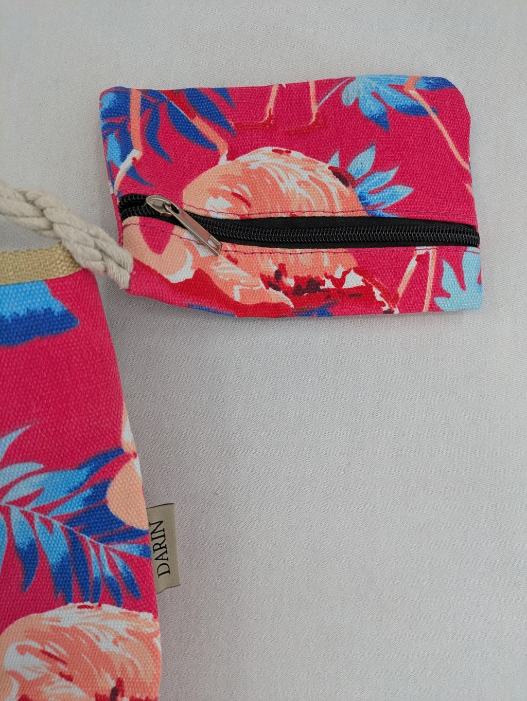 Flamingo pink shopping tote with vibrant tropical flamingo and palm leaf pattern.
