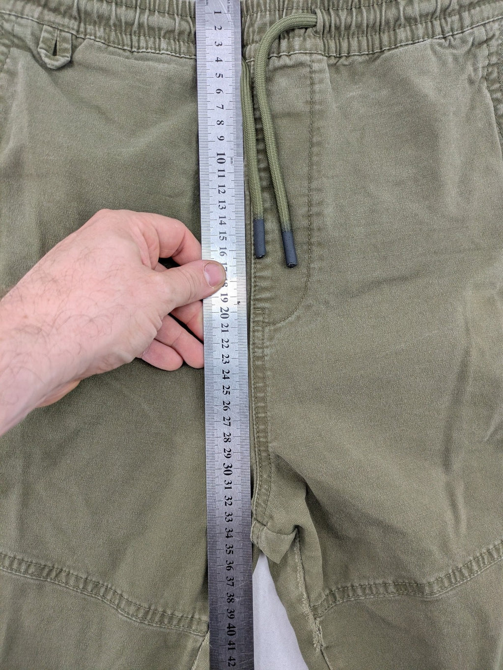 Denim & Co. khaki cargo jogger pants with elastic waistband and multiple pockets.