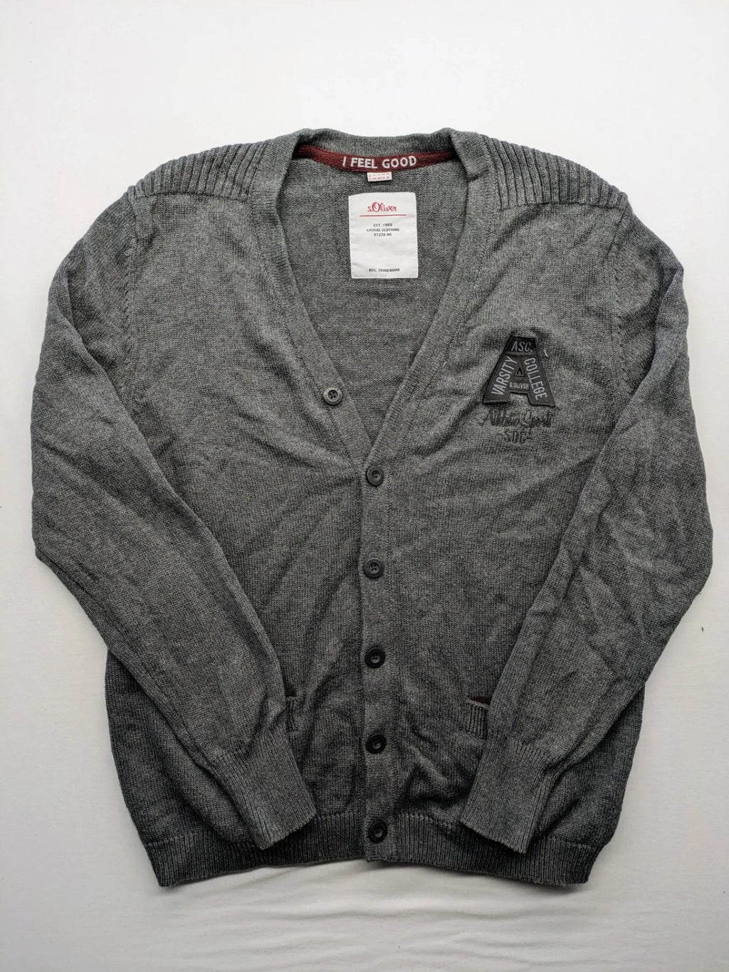s.Oliver grey turtle neck jumper with varsity college patch and button closure.