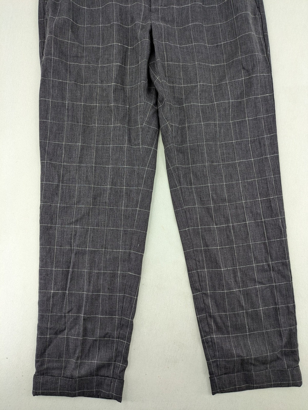 MNG Man grey plaid pants with rolled hem and stretch performance material.