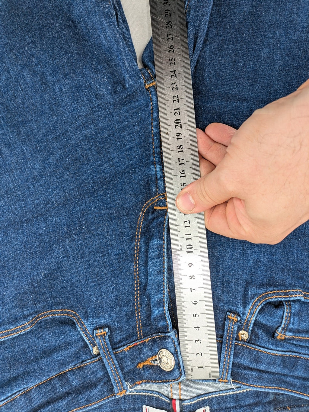 Tommy Hilfiger blue skinny jeans, five-pocket design, made from organic cotton blend.