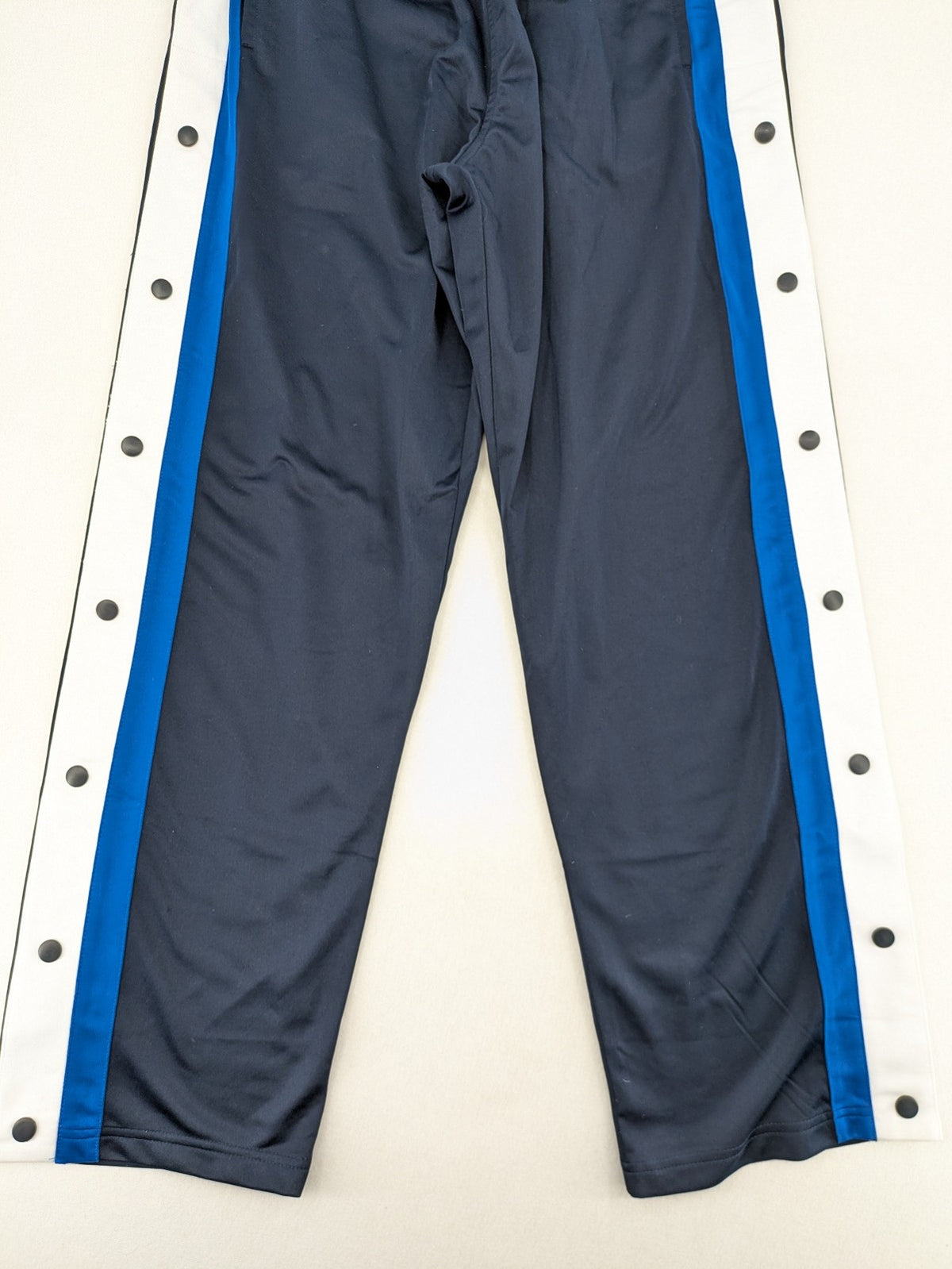 McORVIS blue tearaway training pants with side snap buttons and elastic waistband.