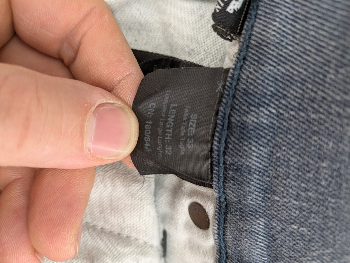 G-Star Raw grey denim straight jeans with classic button fly and subtle branding details.