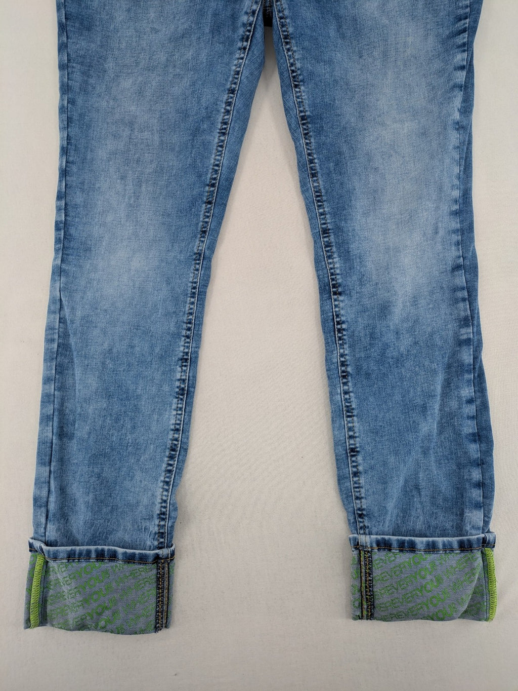 Street One blue straight jeans with green patterned cuffs and button fly detail.