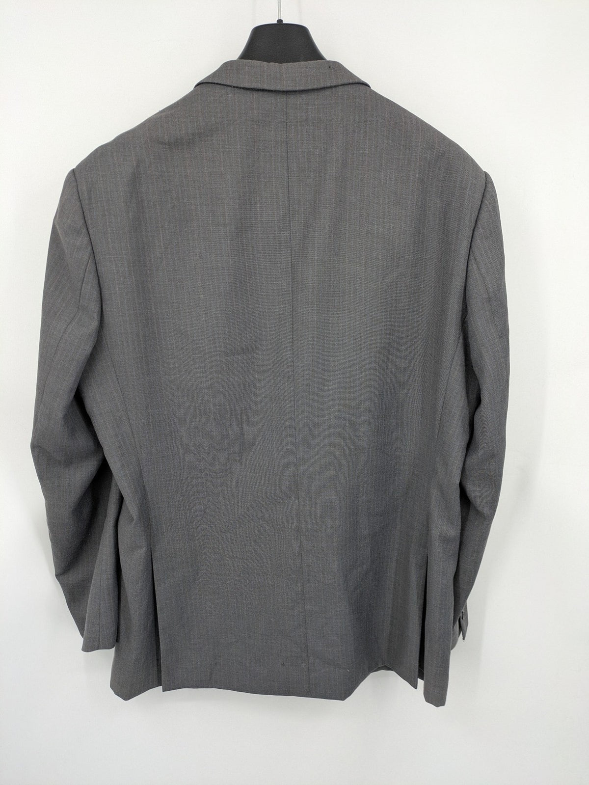Alextrading grey jacket with subtle light blue pinstripe pattern and notch lapels.